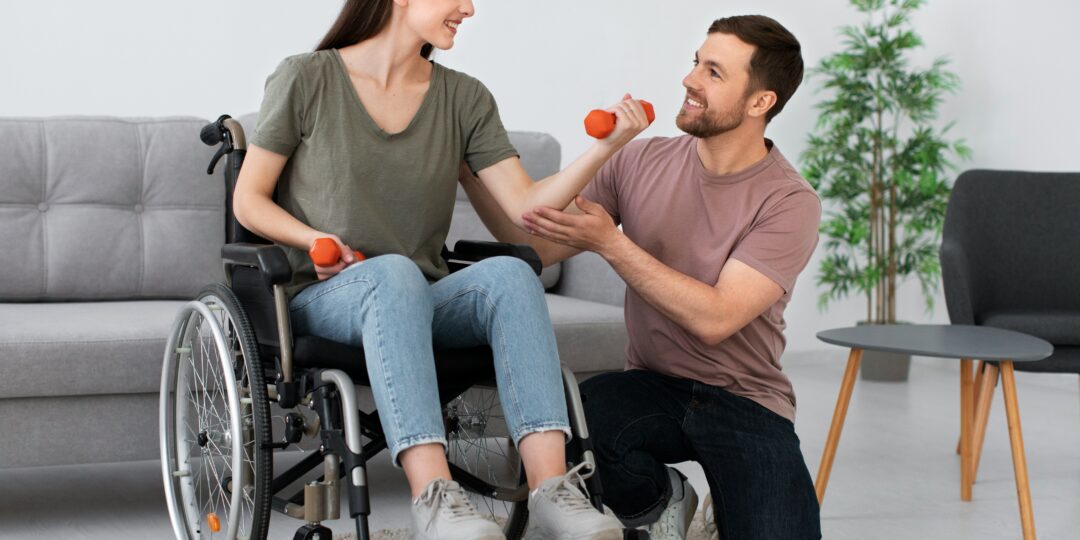 Couple with woman in wheelchair lifting weights | Atlanta home modifications for accessibility