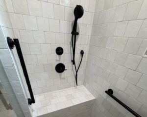 Grab bar installation locations in tile shower